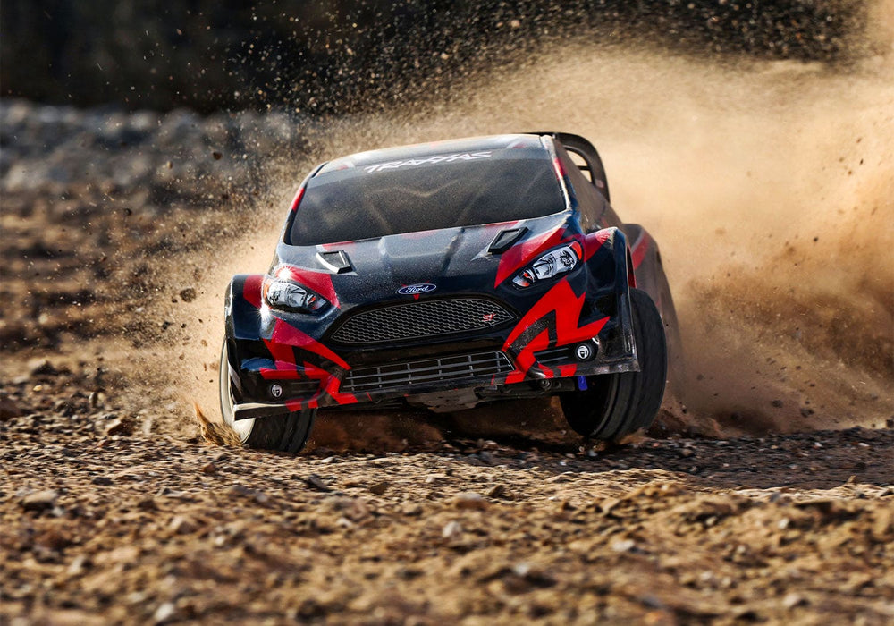 TRA74154-4RED Traxxas Fiesta ST Rally 1/10 Brushless AWD Rally Car RTR - RED **Free battery charger with the purchase of this truck. Please add TRA2827X and TRA2920 to your order  to get it free.** if you order from this promotion it is final sale