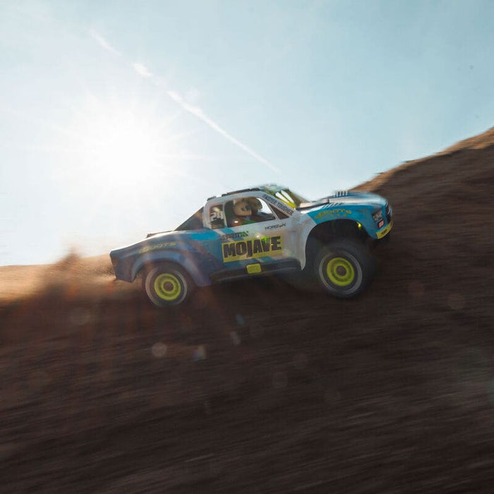 ARA2104T2 MOJAVE GROM MEGA 380 Brushed 4X4 Small Scale Desert Truck RTR with Battery & Charger, Blue/White (FOR A EXTRA BATTERY PLEASE ORDER SPMX142S30H2)