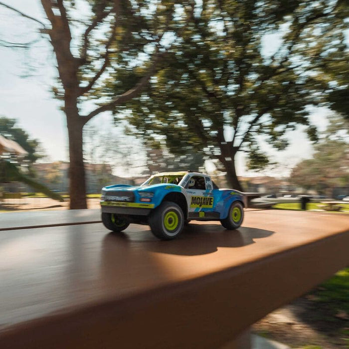 ARA2104T2 MOJAVE GROM MEGA 380 Brushed 4X4 Small Scale Desert Truck RTR with Battery & Charger, Blue/White (FOR A EXTRA BATTERY PLEASE ORDER SPMX142S30H2)