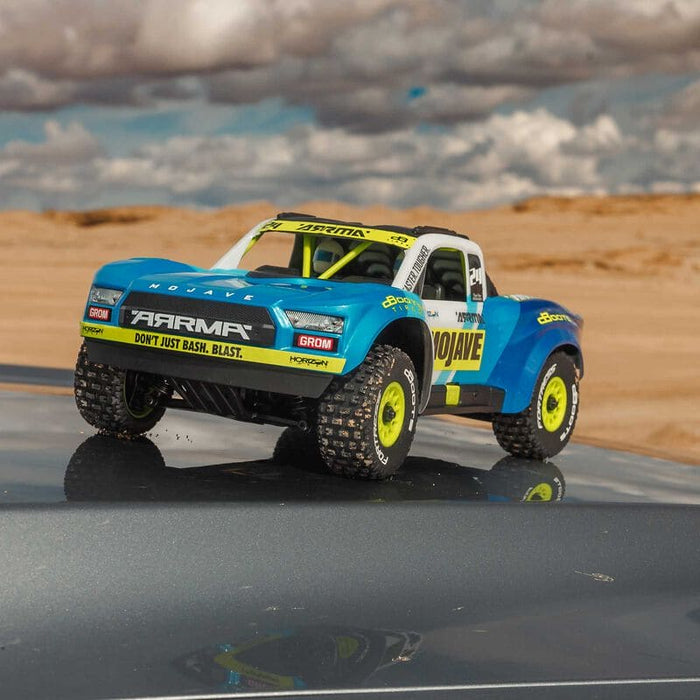 ARA2104T2 MOJAVE GROM MEGA 380 Brushed 4X4 Small Scale Desert Truck RTR with Battery & Charger, Blue/White (FOR A EXTRA BATTERY PLEASE ORDER SPMX142S30H2)