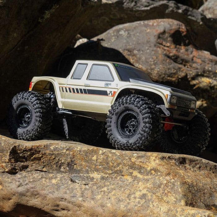 AXI-3071 1/10 SCX10 III Coyote 4X4 RTR Rock Crawler (Battery & Charger Included), Gold
