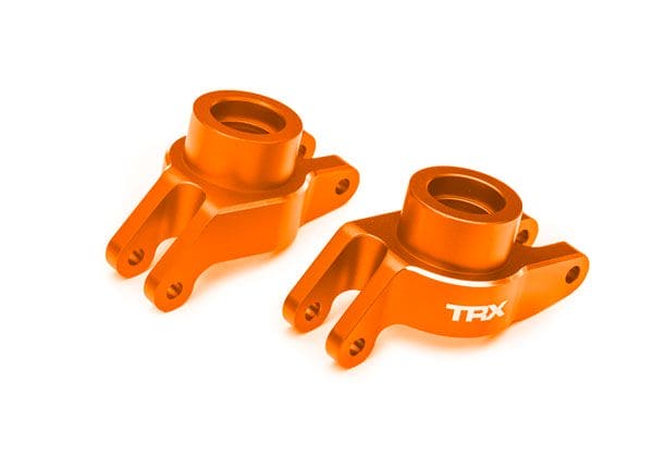 TRA10252-ORNG Traxxas Carriers, stub axle, alum, rear, left & right (Orange)