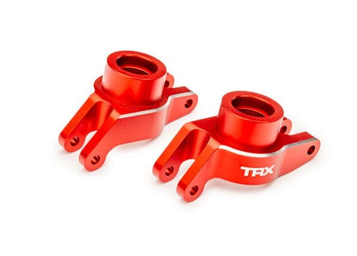 TRA10252-RED Traxxas Carriers, stub axle, alum, rear, left & right (Red)