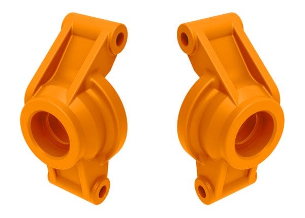 TRA10752-ORNG Traxxas Carriers, stub axle (orange) (rear) (left & right)