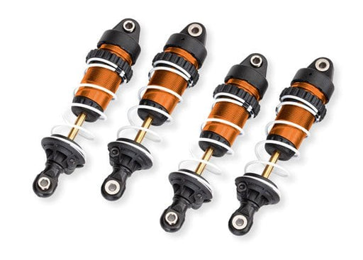 TRA10765-ORNG Traxxas Shocks, GTR long, orange (assembled with springs) (4)