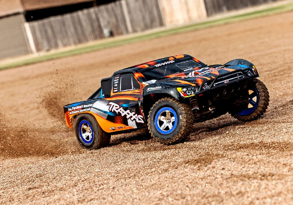 TRA58034-8ORANGE Traxxas Slash 1/10 2WD Short Course Racing Truck RTR - Orange **SOLD SEPARATELY AND REQUIRED TRA2912 AND TREA2916 OR FOR QUCK CHARGER &LONG RUN TIME BATTERY ORDER PART # TRA2992**