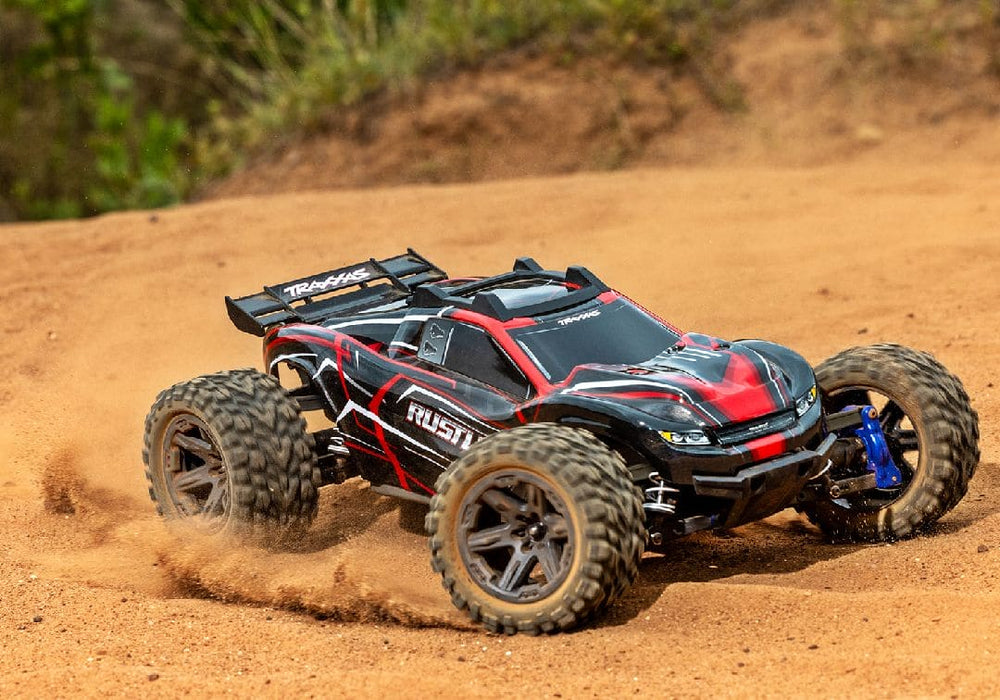TRA67164-4RED Traxxas Rustler 1/10 4X4 Brushless Stadium Truck RTR - Red **Free battery charger with the purchase of this truck. Please add TRA2827X and TRA2920 to your order  to get it free.** if you order from this promotion it is final sale