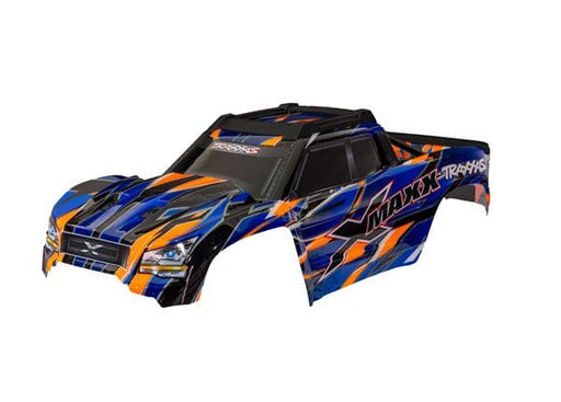 TRA7867-ORNG Traxxas Body, X-Maxx, orange (painted, decals applied)