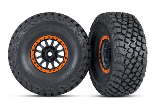 TRA8474-ORNG Traxxas Tires & wheels, Method 101 black w/orange Baja KR3 (2)