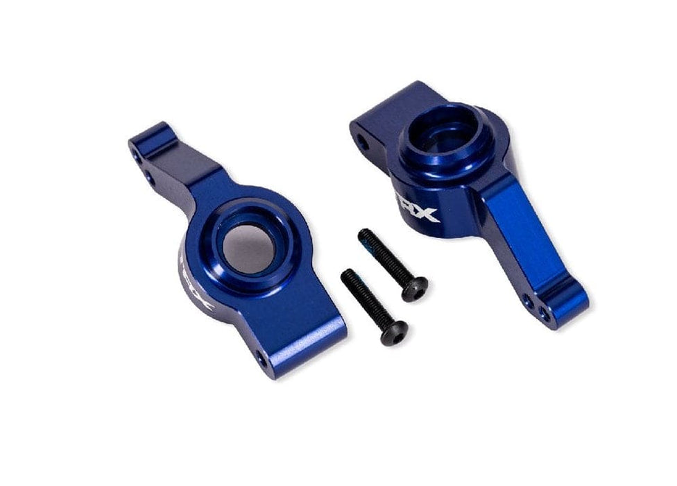 TRA9065-BLUE Traxxas Carriers, stub axle, rear, left/right (blue)