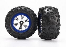 TRA7274 Tires and wheels, assembled, glued (Geode chrome, blue beadlock style wheels, Canyon AT tires, foam inserts) (1 left, 1 right)