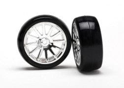 TRA7573 Tires & wheels, assembled, glued (12-spoke chrome wheels, slick tires) (2)