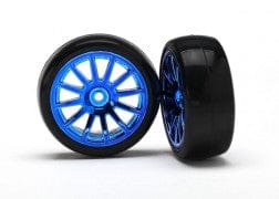 TRA7573R Tires & wheels, assembled, glued (12-spoke blue chrome wheels, slick tires) (2)