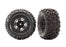 TRA6792 Traxxas Tires & wheels, assembled, glued (2.8") (Rustler 4X4 black wheels, Sledgehammer tires, foam inserts) (2) (TSM rated)