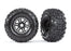 TRA8973 Traxxas Sledgehammer Tires & wheels, glued (black wheels)