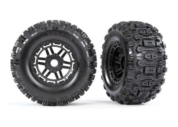 TRA8973 Traxxas Sledgehammer Tires & wheels, glued (black wheels)