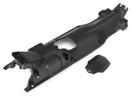 TRA5637X  Skidplate, transmission, nylon (black)/ cover
