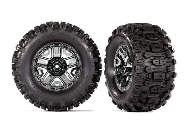 TRA9072 Traxxas Tires & wheels, assembled, glued (black chrome 2.8" wheels, Sledgehammer tires, foam inserts) (2) (TSM rated)