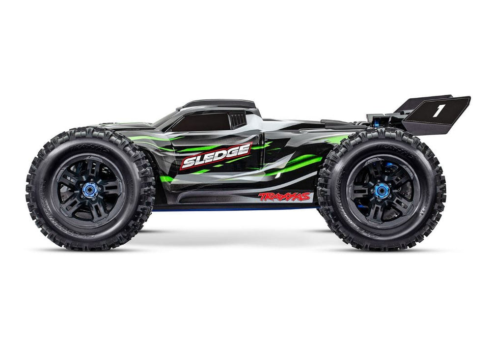 TRA95076-4GREEN Traxxas Sledge: 1/8 Scale 4WD Brushless Monster Truck - Green YOU will need this part #TRA2990   to run this truck